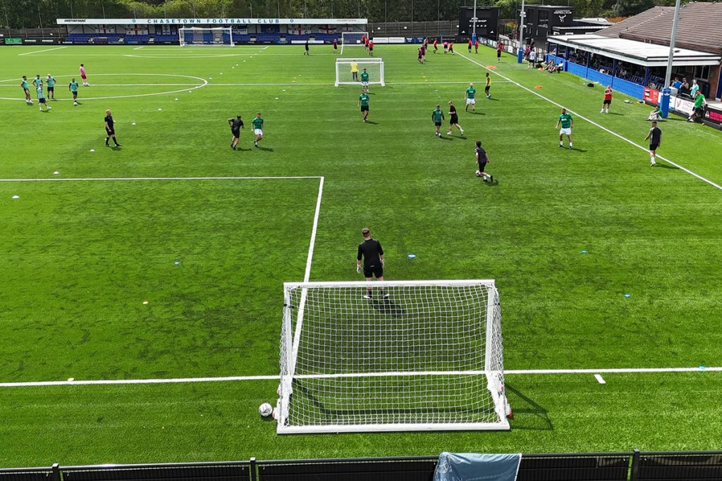 Elevated view of matches under way at Crown Highways' charity football tournament at Chasetown Football Club